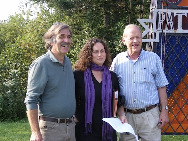 Representatives of three trail organizations celebrate the linking of trails in the U.S. and Canada.