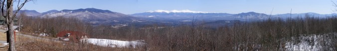 view of the Presidential Range in New Hampshire, with snow on summits