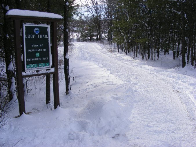 snow-covered trail at a municipal conservation area