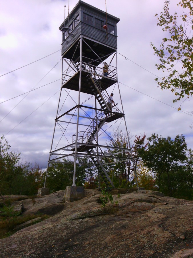 Pawtuckaway fire tower. Barely visible on the underside of the cab are charts describing the landmarks in each direction.